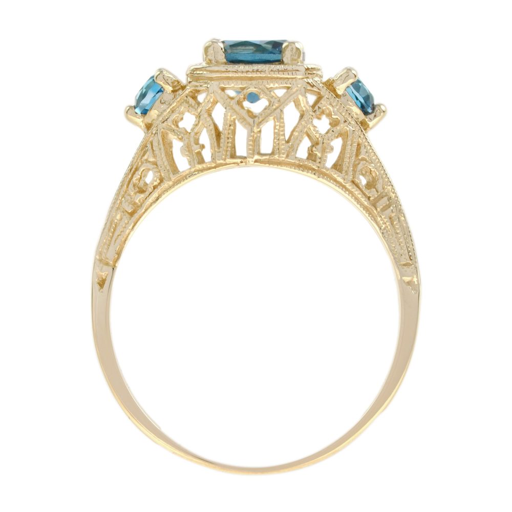 Blue Topaz Three Stone Filigree Yellow Gold Ring