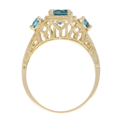 Blue Topaz Three Stone Filigree Yellow Gold Ring