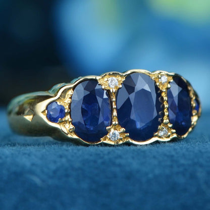 Antique Style Sapphire Three Stone Trilogy Ring in Yellow Gold