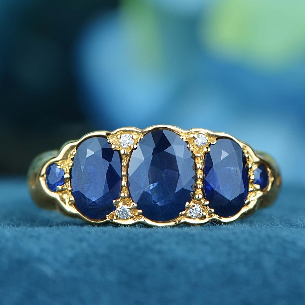 Antique Style Sapphire Three Stone Trilogy Ring in Yellow Gold