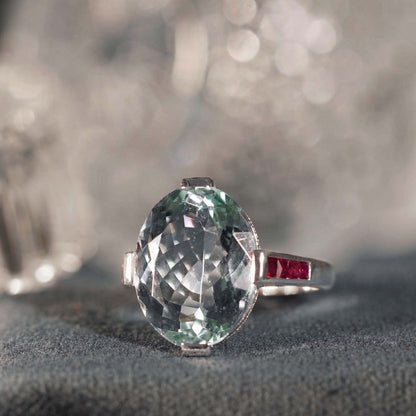6.34ct Aquamarine Solitaire Ring with Ruby Shoulders
