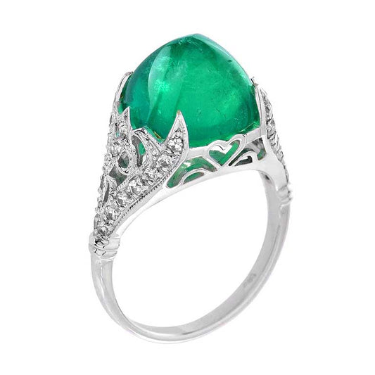 Sugarloaf Cabochon Colombian Emerald and Diamond Cocktail Ring; 7.58ct sugarloaf cabochon-cut Colombian emerald set high within a 0.33ct single-cut diamond-set openwork scrolled mount in 18ct white gold
