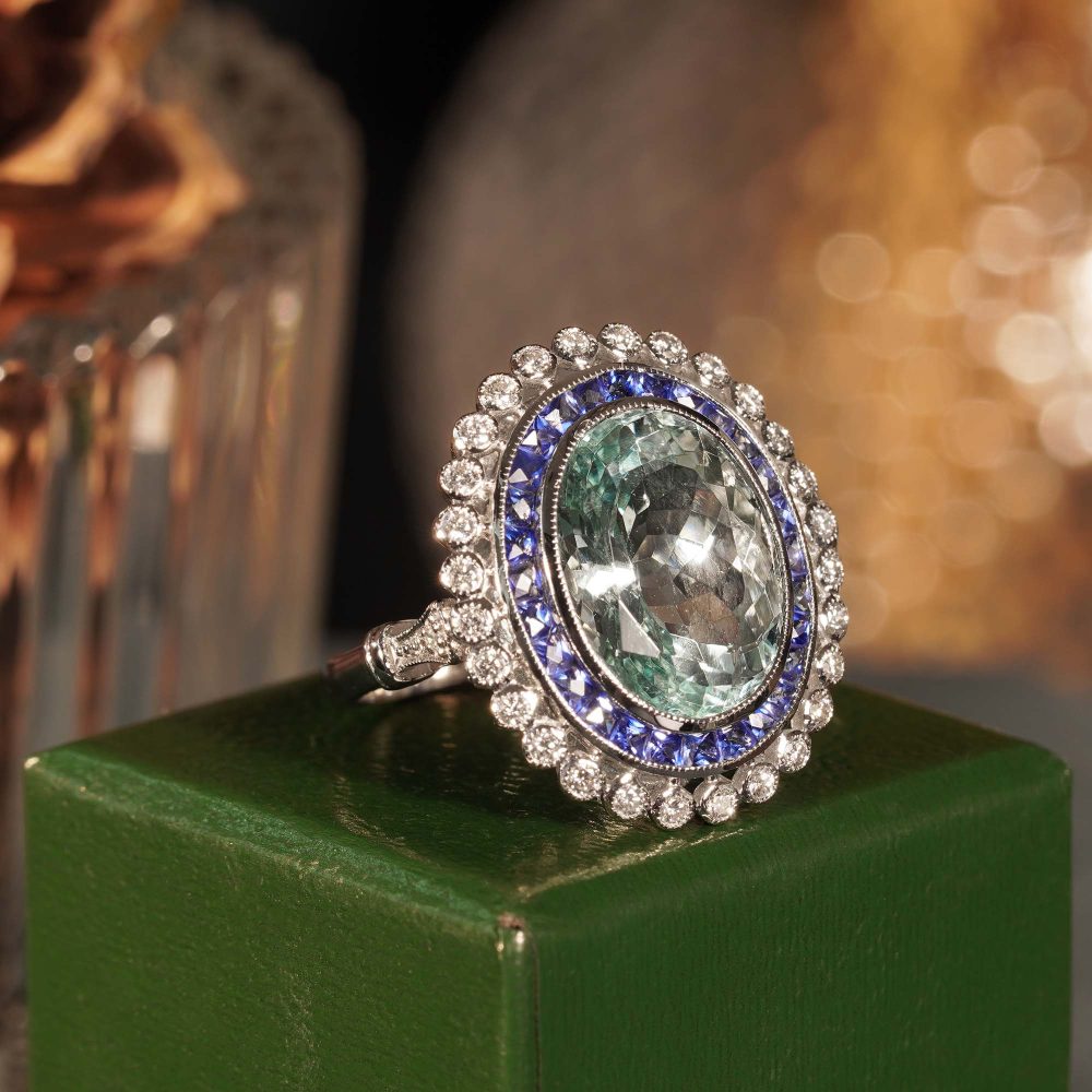7.58ct Oval Aquamarine Sapphire and Diamond Cluster Dress Ring