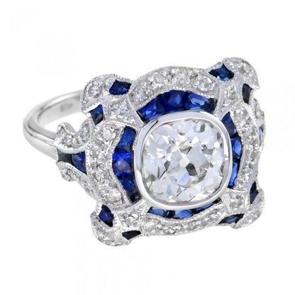 Art Deco Style GIA Certified 1.52ct Diamond and Sapphire Dress Ring; central 1.52ct old mine-cut diamond is surrounded by French-cut blue sapphires and single-cut diamonds, in 18ct white gold, with GIA certificate