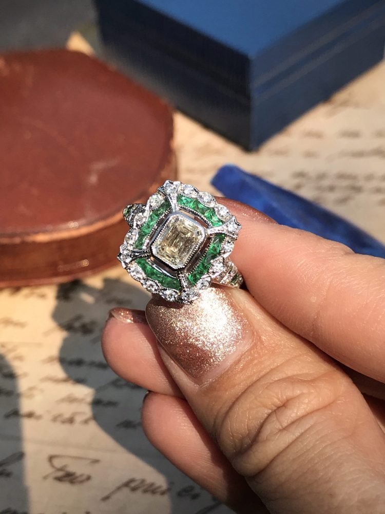 GIA Certified 1ct Emerald Cut Diamond and Emerald Cluster Engagement Ring