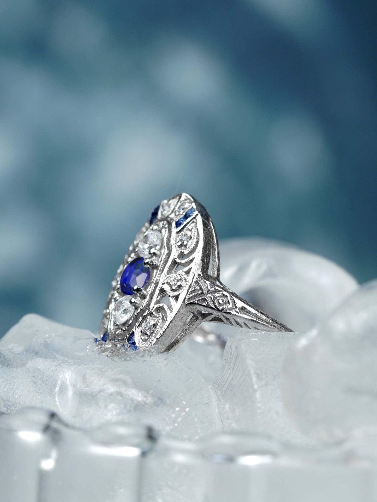 Sapphire and Diamond Three Stone Cluster Plaque Ring