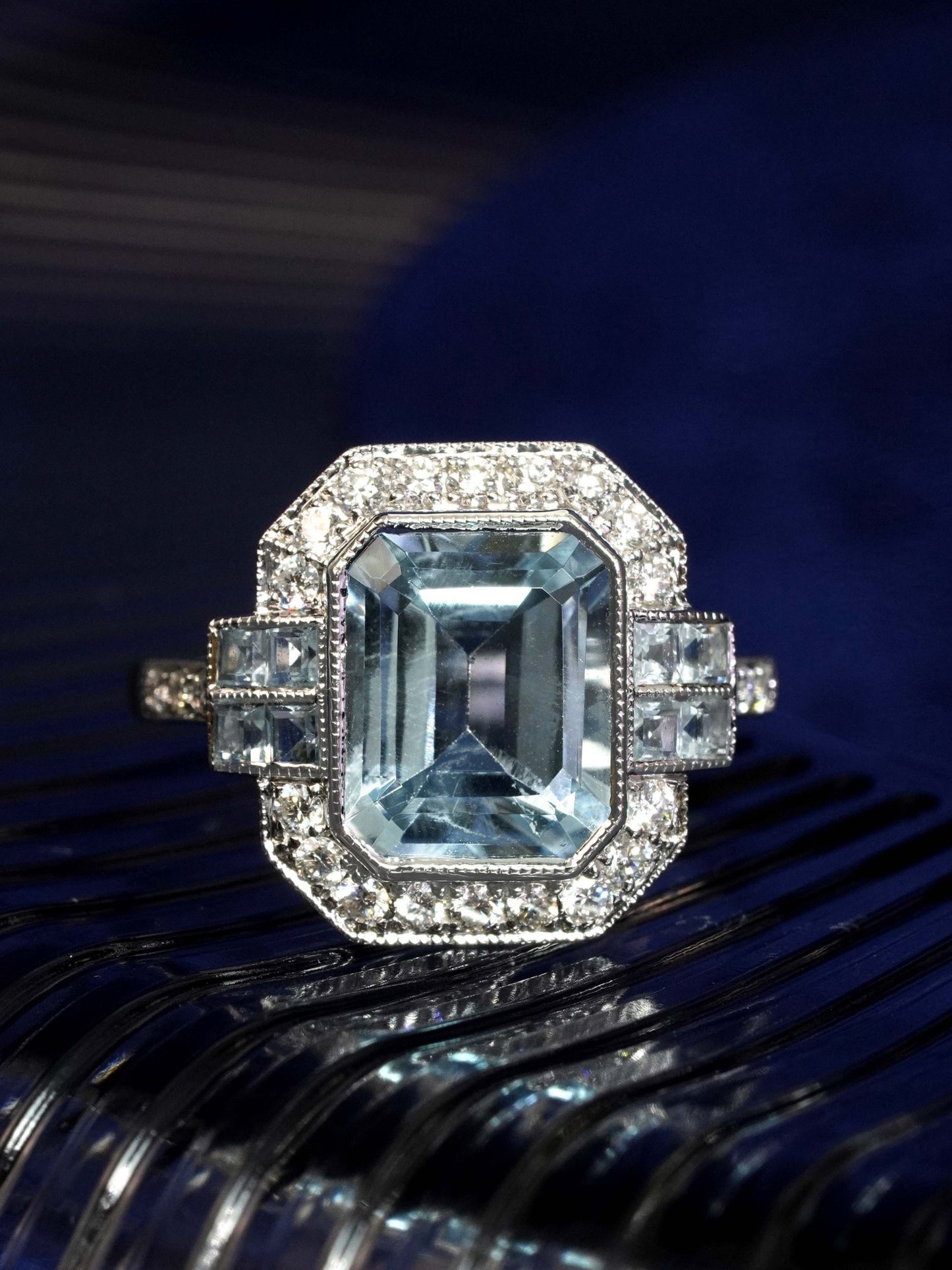 2.90ct Emerald Cut Aquamarine and Diamond Cluster Engagement Ring in 14ct Gold