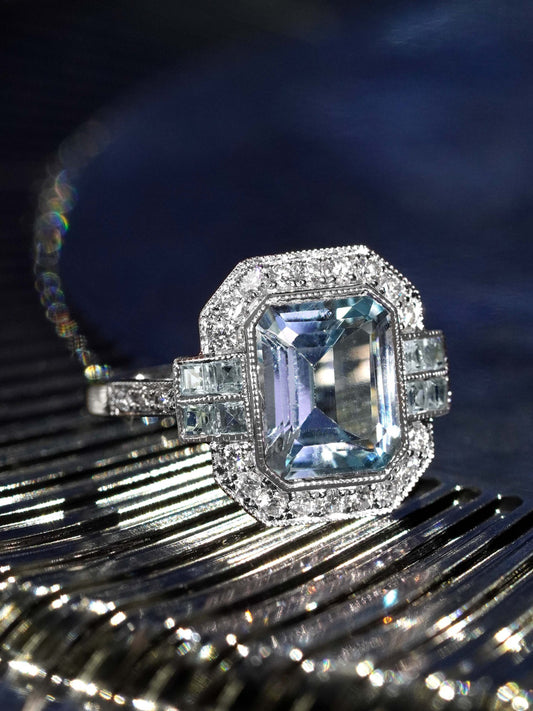 2.90ct Emerald Cut Aquamarine and Diamond Cluster Engagement Ring in 14ct Gold