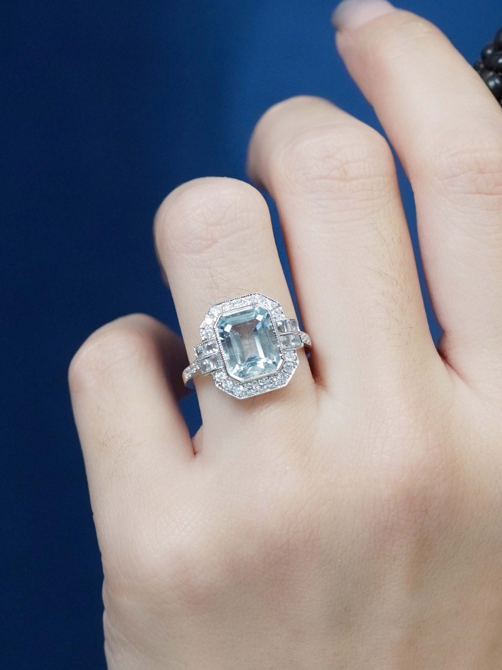 2.90ct Emerald Cut Aquamarine and Diamond Cluster Engagement Ring in 14ct Gold