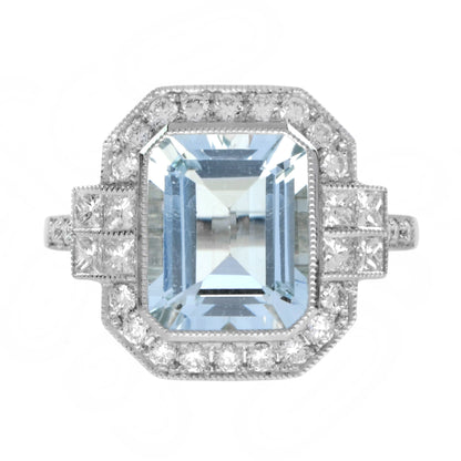 2.90ct Emerald Cut Aquamarine and Diamond Cluster Engagement Ring in 14ct Gold