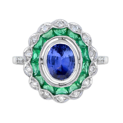 1.50ct Oval Ceylon Sapphire with Emerald and Diamond Cluster Engagement Ring