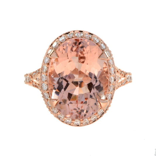 9.60ct Oval Morganite and Diamond Cluster Cocktail Ring in 18ct Rose Gold; 9.63ct oval morganite with a diamond surround accented with diamond-set split shoulders