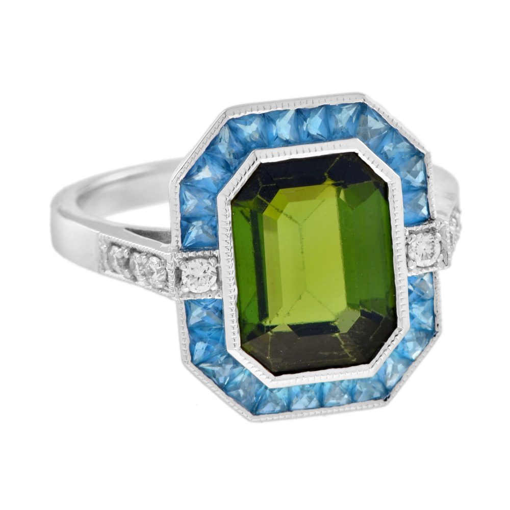 3.41ct Emerald Cut Green Tourmaline and Blue Topaz Cluster Ring with Diamond Shoulders in 14ct white gold with diamond shoulders