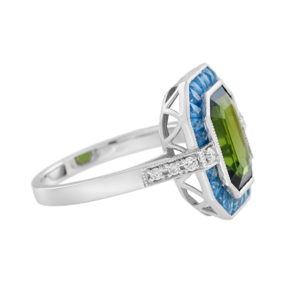 3.41ct Emerald Cut Green Tourmaline and Blue Topaz Cluster Ring with Diamond Shoulders in 14ct white gold with diamond shoulders