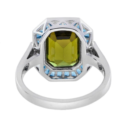 3.41ct Emerald Cut Green Tourmaline and Blue Topaz Cluster Ring with Diamond Shoulders in 14ct white gold with diamond shoulders
