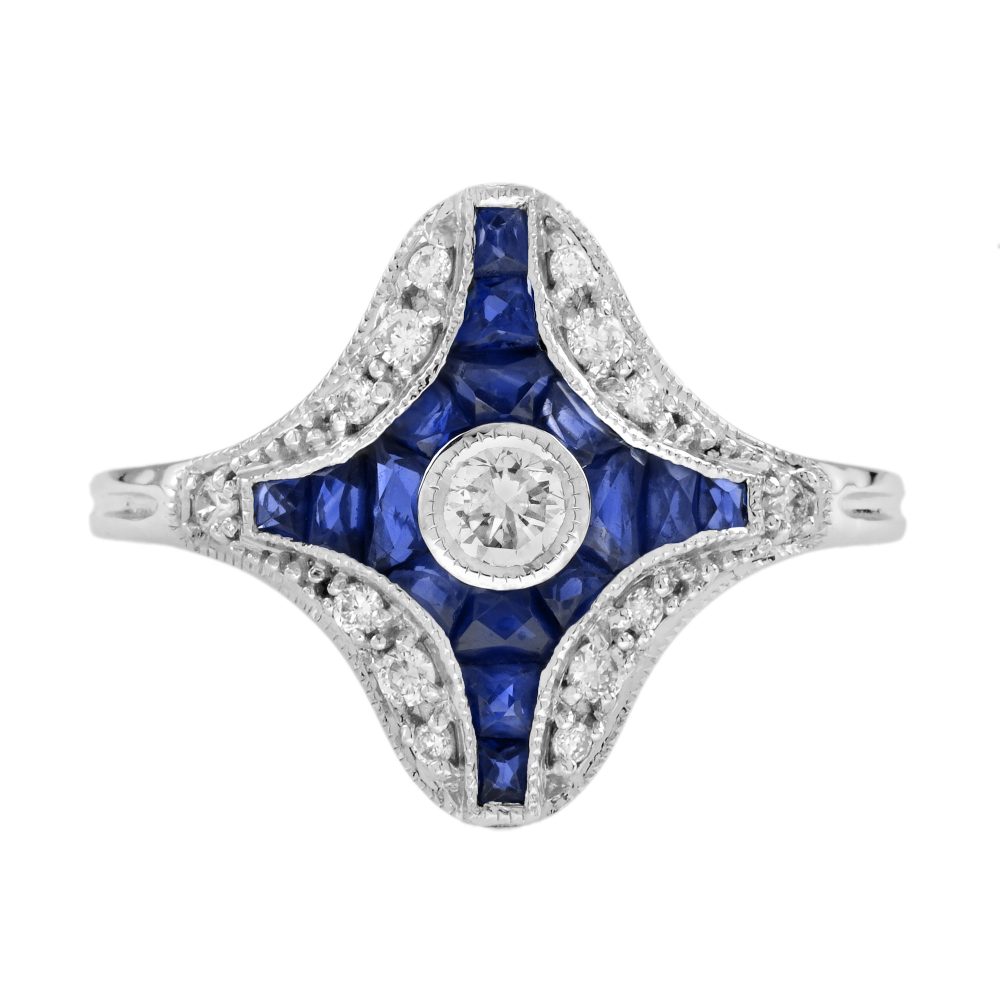 Diamond and Sapphire Navette Cluster Plaque Ring, central sparkling diamond surrounded by calibre French-cut blue sapphires within outer diamond border in 14ct white gold