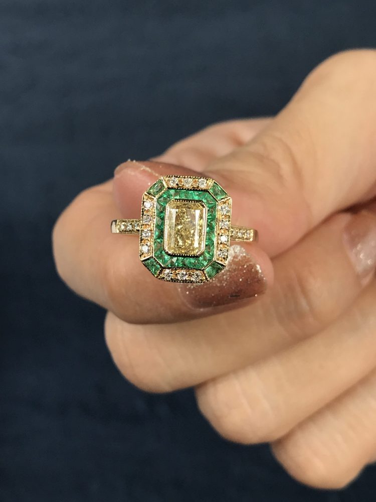 Emerald Cut Fancy Light Yellow Diamond and Emerald Cluster Engagement Ring
