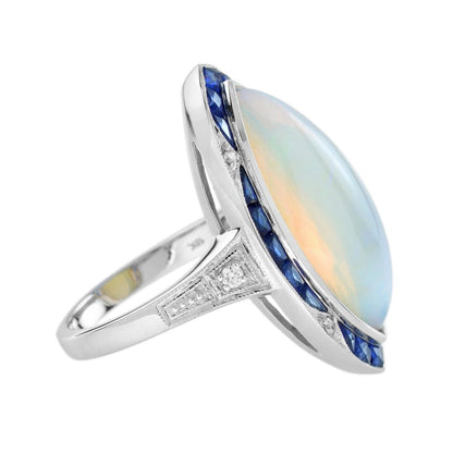 6.55ct Marquise Opal with Sapphire and Diamond Cluster Navette Ring