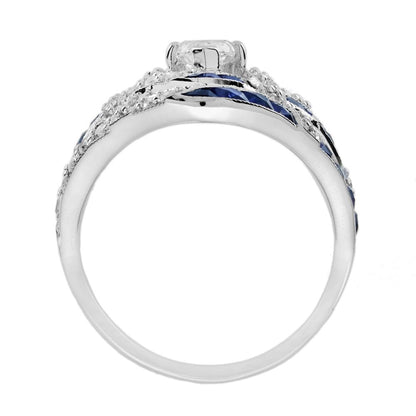 GIA 1ct Marquise Diamond and Sapphire Cluster Dress Ring, D Colour Internally Flawless, GIA Certified D IF 1ct marquise-cut diamond centrally set to tapered navette surround studded with sparkling diamonds accented with lines of French cut blue sapphires in 18ct white gold with a GIA certificate