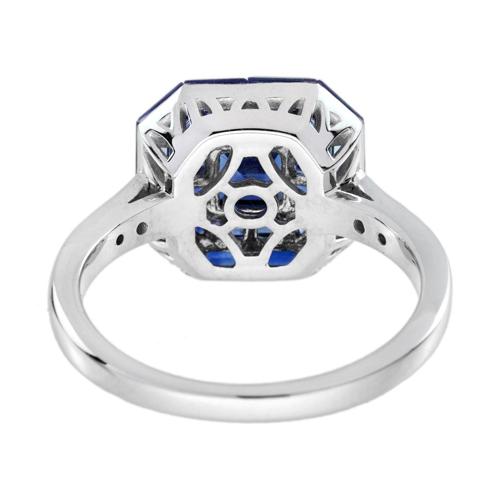 Octagonal Sapphire Cluster Solitaire Engagement Ring, 5.72cts multi asscher and calibre cut sapphires arranged in invisible setting to produce an octagonal shaped design