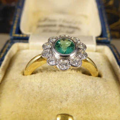 0.50ct Oval Cut Emerald and Diamond Cluster Ring