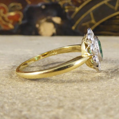 0.50ct Oval Cut Emerald and Diamond Cluster Ring