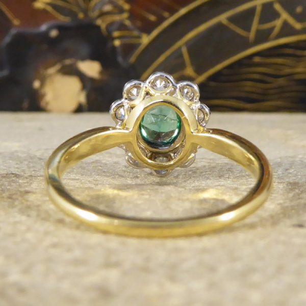 0.50ct Oval Cut Emerald and Diamond Cluster Ring