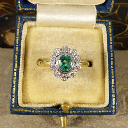 0.50ct Oval Cut Emerald and Diamond Cluster Ring