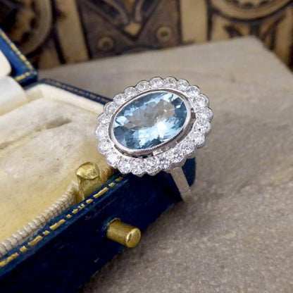 Aquamarine and Diamond Halo Cluster Ring