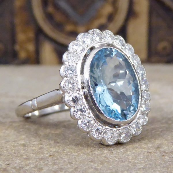 Aquamarine and Diamond Halo Cluster Ring