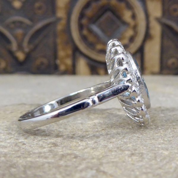 Aquamarine and Diamond Halo Cluster Ring