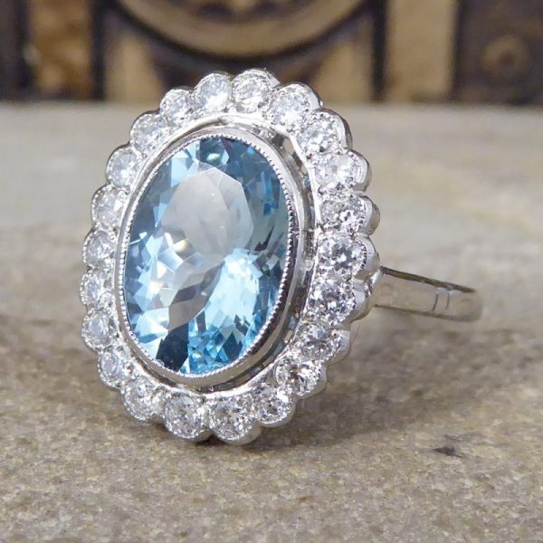 Aquamarine and Diamond Halo Cluster Ring