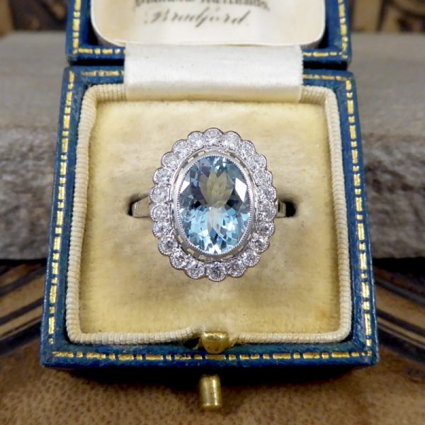 Aquamarine and Diamond Halo Cluster Ring