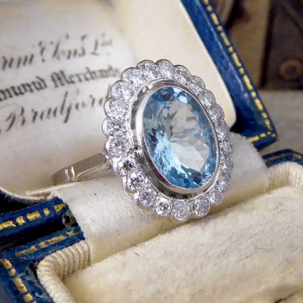 Aquamarine and Diamond Halo Cluster Ring