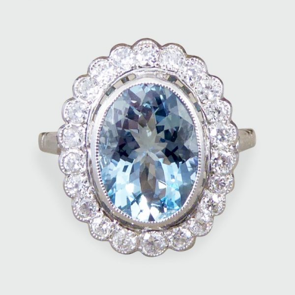 Aquamarine and Diamond Halo Cluster Ring