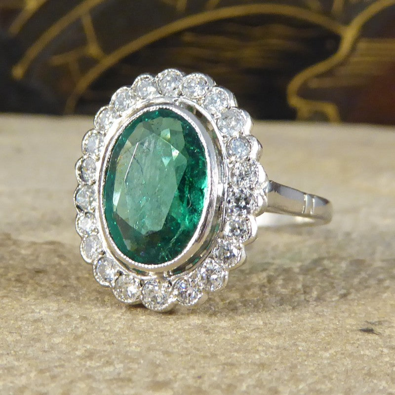 1.45ct Oval Cut Emerald and Diamond Cluster Ring