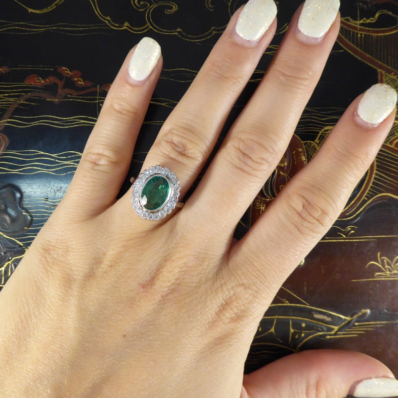 1.45ct Oval Cut Emerald and Diamond Cluster Ring