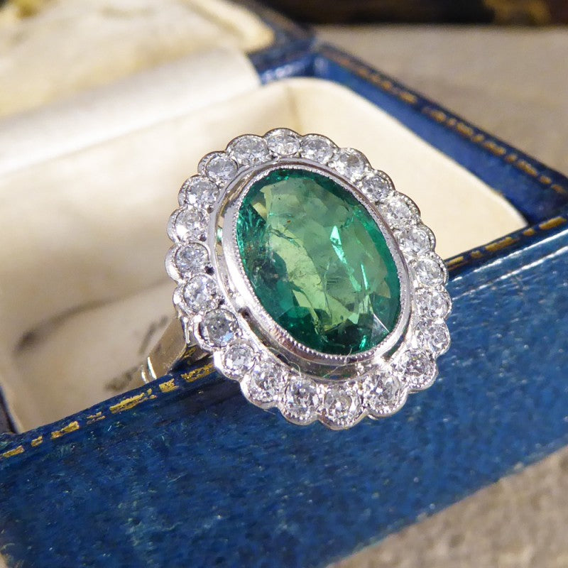 1.45ct Oval Cut Emerald and Diamond Cluster Ring