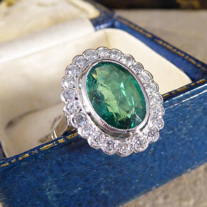 1.45ct Oval Cut Emerald and Diamond Cluster Ring