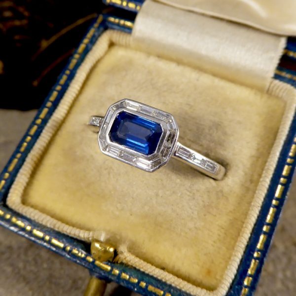 Emerald Cut Sapphire and Diamond Cluster Ring in Platinum