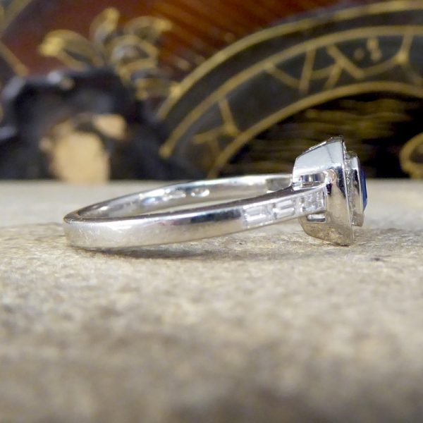 Emerald Cut Sapphire and Diamond Cluster Ring in Platinum