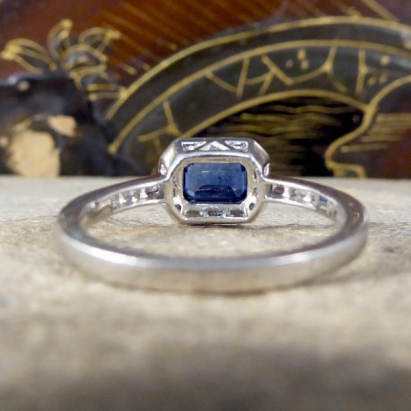 Emerald Cut Sapphire and Diamond Cluster Ring in Platinum