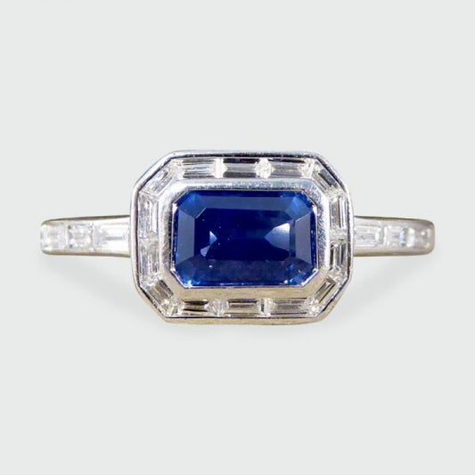 Emerald Cut Sapphire and Diamond Cluster Ring in Platinum