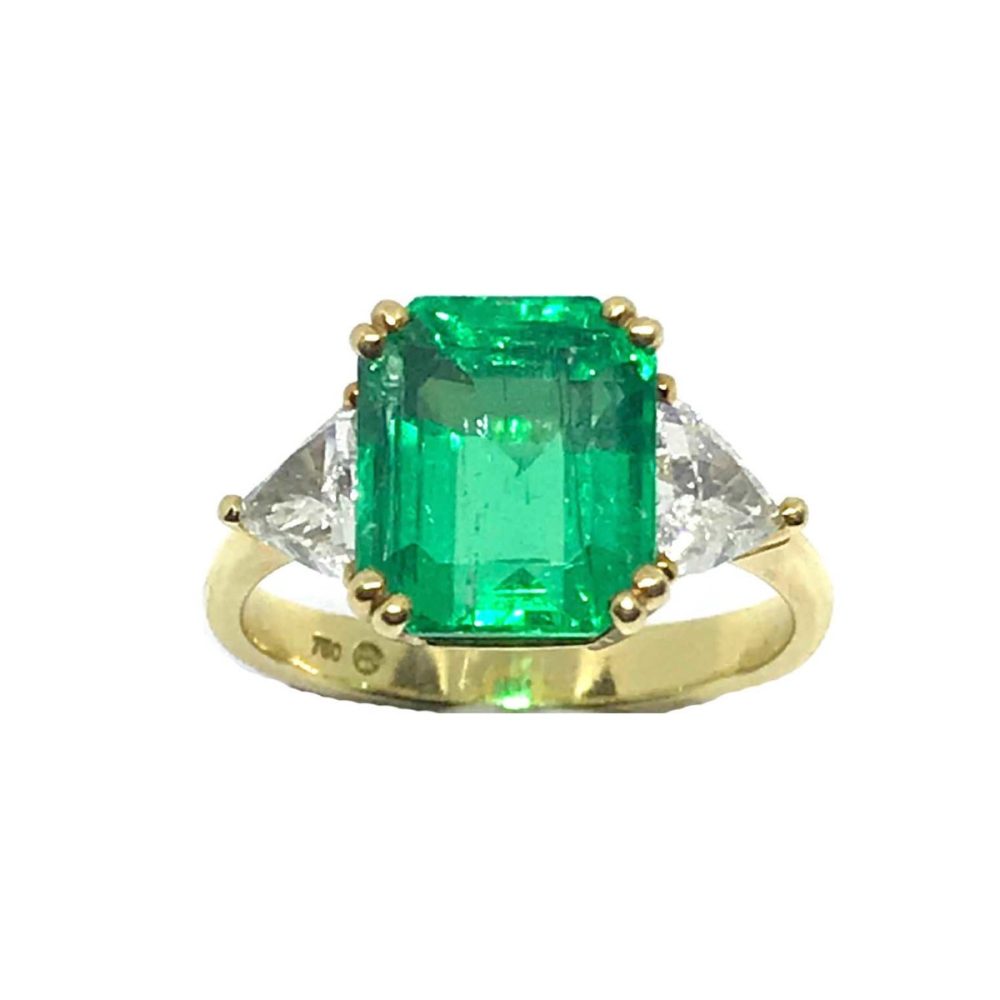 Colombian Emerald and diamond three stone ring
