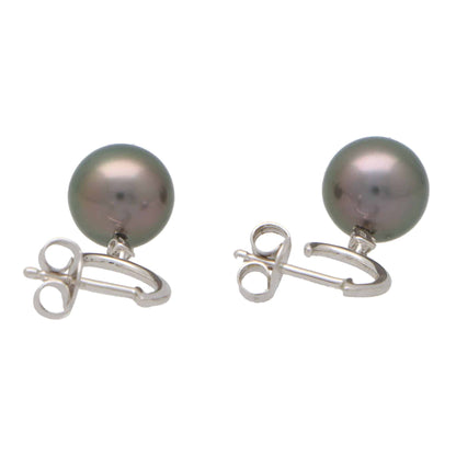 Tahitian pearl and diamond drop earrings in white gold.