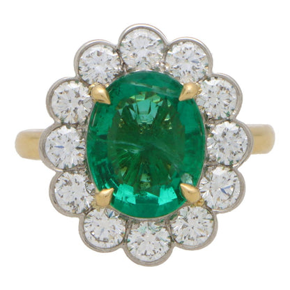 A fine natural 3.42 Carats Emerald and Diamond Cluster Ring