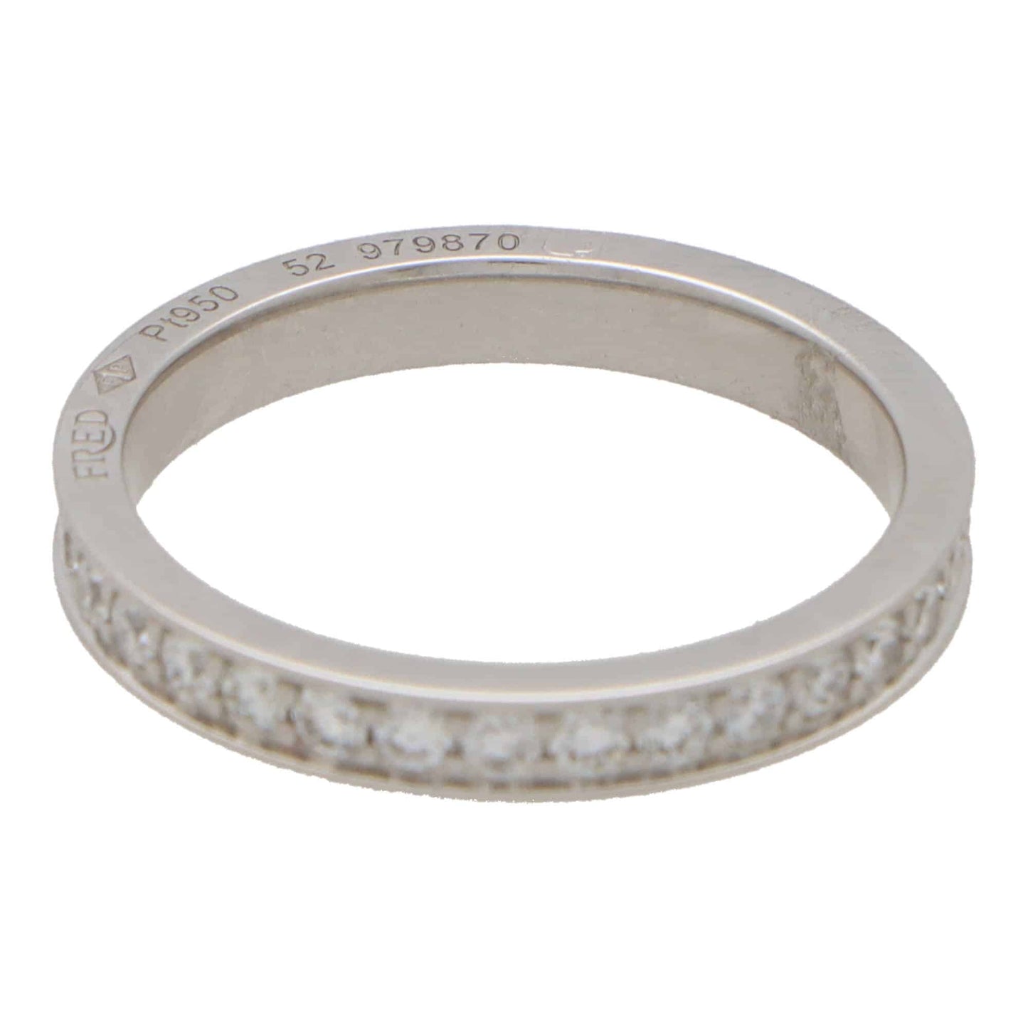 A white metal diamond set full eternity band ring stamped FRED Pt950 52 979870, on a white background