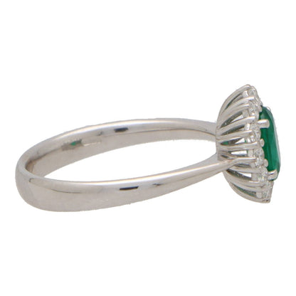 Contemporary 0.58ct Emerald and Diamond Cluster Ring