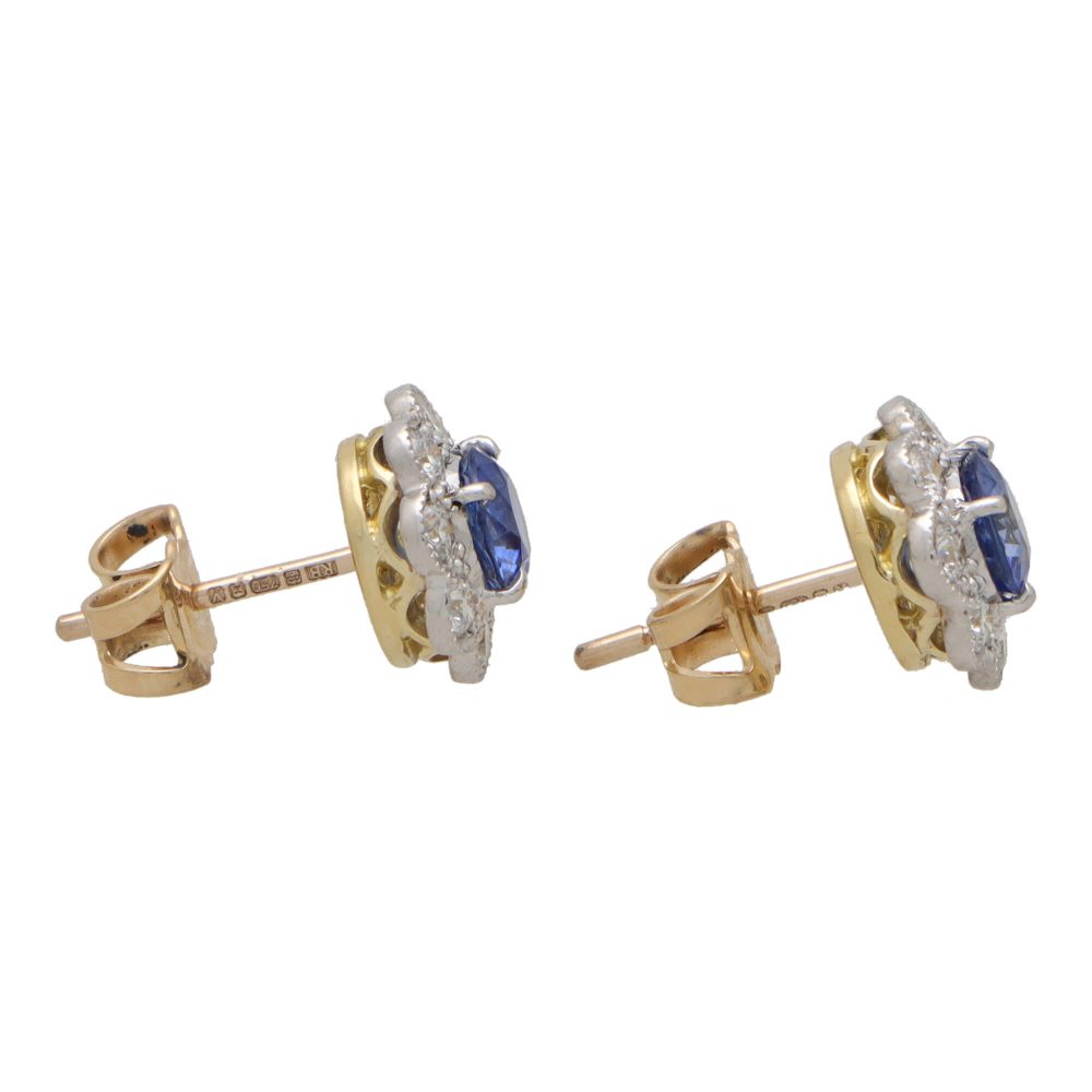 Sapphire and diamond floral cluster earrings in white and yellow gold.
