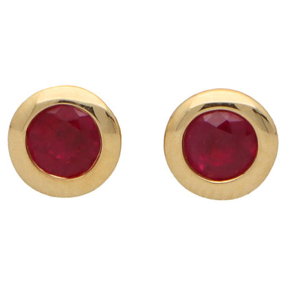 Ruby stud earrings set in 18 carat yellow gold.